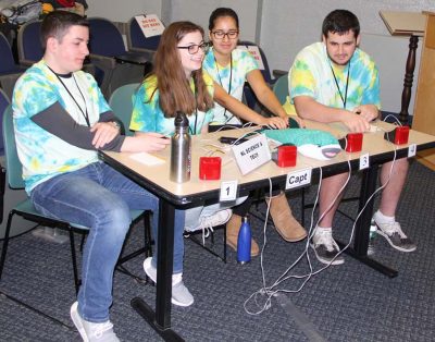 Members of one of two teams from the Science and Technology Magnet High School of Southeastern Connecticut take a break before the next round of questions.