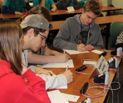 Norwich Free Academy team members compete in the timed short-answer portion of the contest.