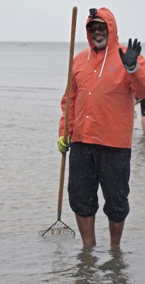 Rainy weather didn't deter the hardy clammers from taking part in the clamming clinic. Photo: Judy Preston