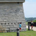 Quest participants count the openings in the blockhouse at Fort Trumbull to solve one of the clues.