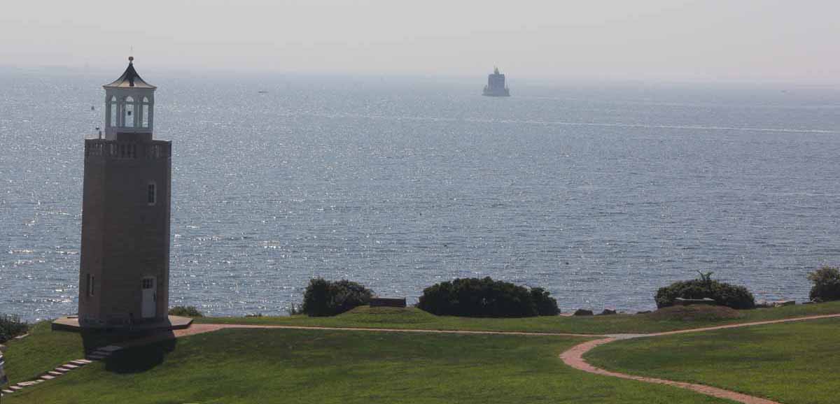 Avery Point Light, left, and Ledge Light, center, are two of the three lighthouses visible from campus.