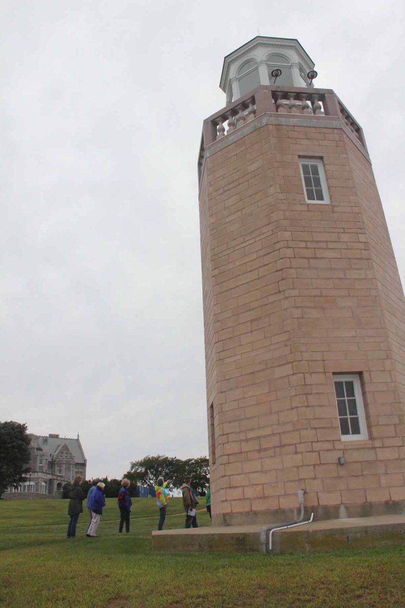 Judy Preston shared information about the history of the Avery Point campus, including the lighthouse, during the habitat walk.
