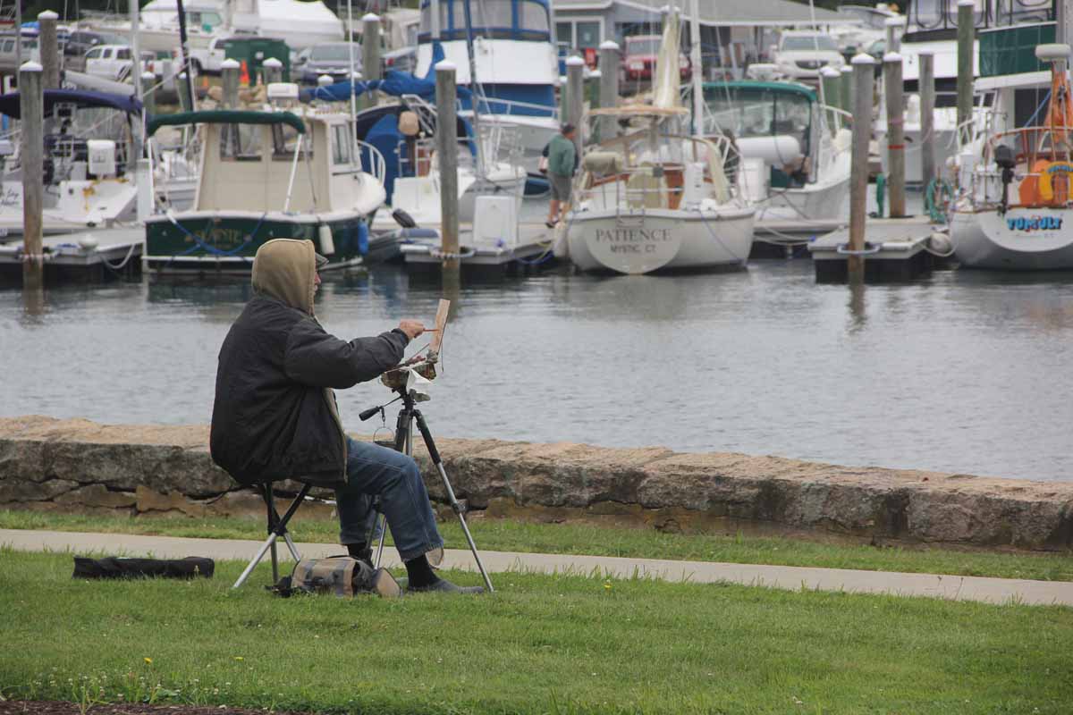 Doug Andersen of Simsbury set up his easel near the seawall between the campus and the Shennecossett Yacht Club.