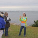 Judy Preston tells members of the painters group about the coastal habitats at Avery Point.
