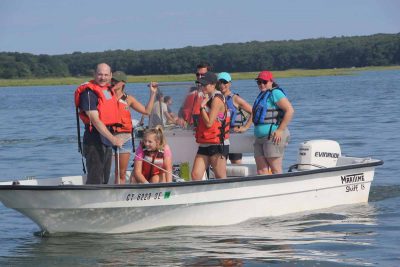 UConn students involved in the Little Narragansett Bay research project return from collecting water and sediment samples in September.