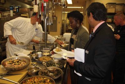 Juliet Wong, center, and Jude Mascarenhas, right, sample dishes using kelp prepared by chef Jeff Trombetta. left, during an event at the Sheraton Hartford South on Dec. 13. Wong is the hotel's convertion services manager and Mascarenhas is its director of operations.