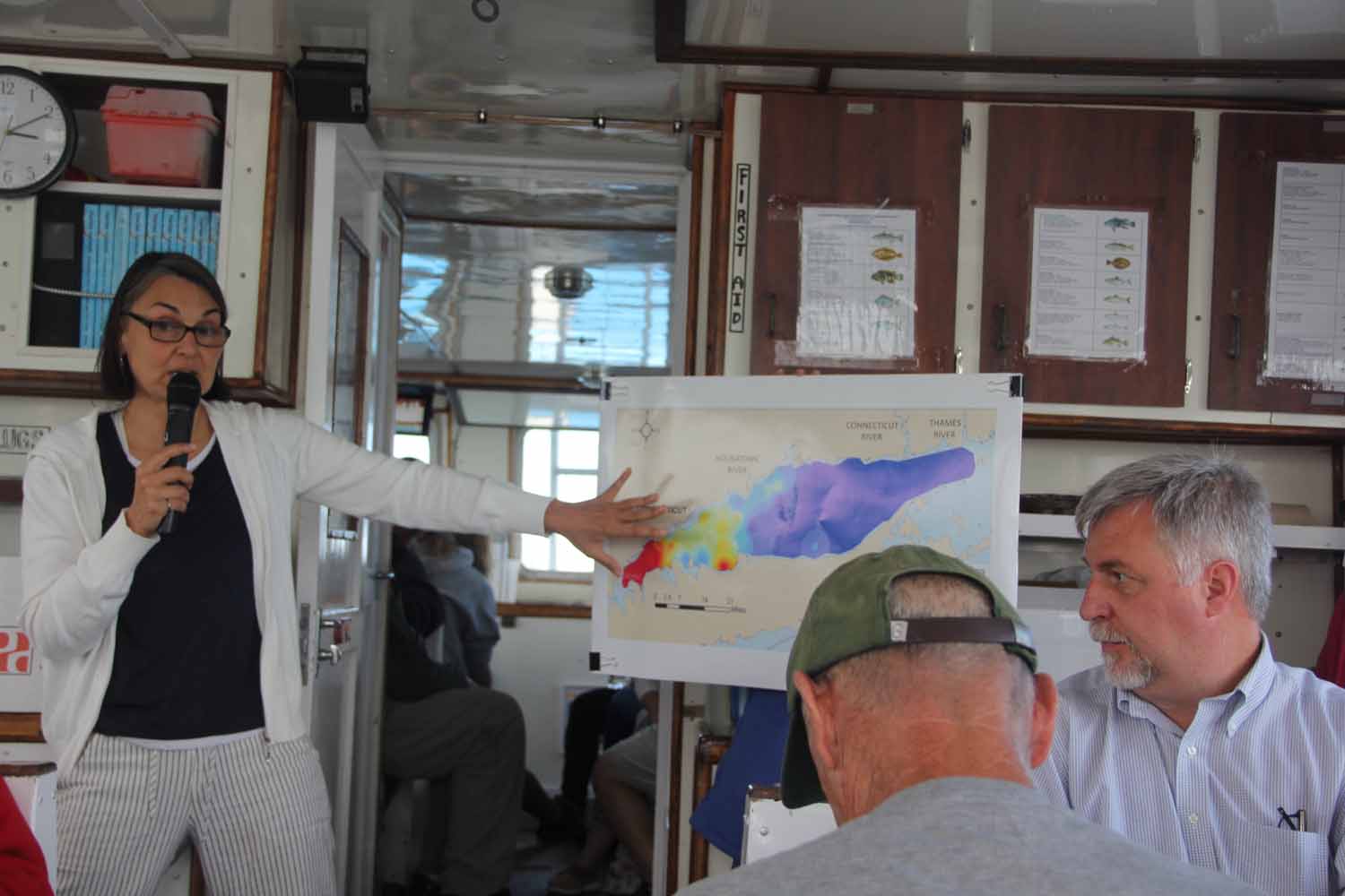 Marine Science Prof. Penny Vlahos shows a map of the extent of hypoxia in Long Island Sound as she describes her research into the biogeochemical processes in the estuary.