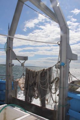 Nets used for trawl samplings during Project Oceanology trips for school groups hung on the bow as the vessel traversed the eastern end of Long Island Sound.