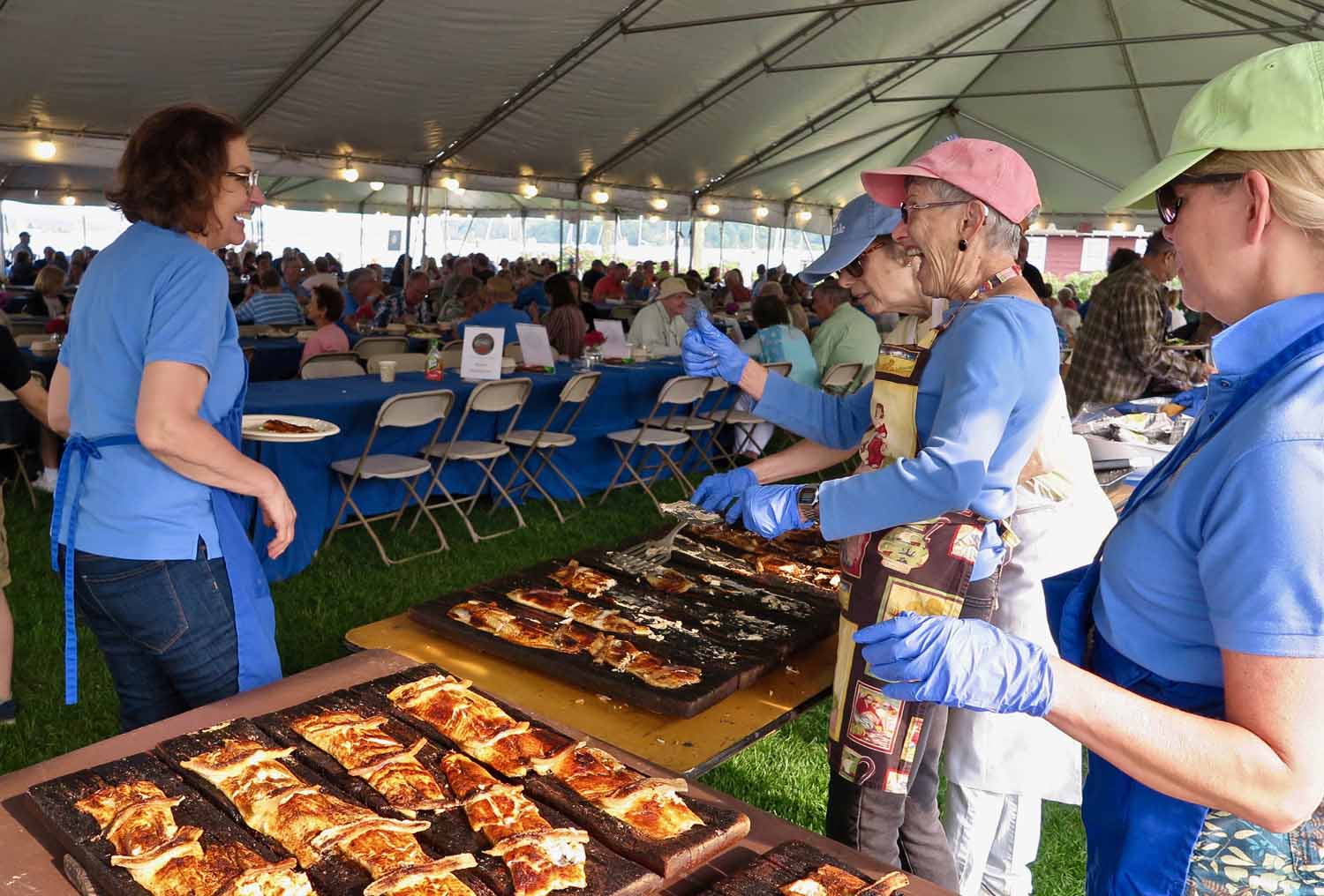 he 61st Essex Annual Shad Bake relies on dozens of volunteers as servers, setup crews and cooks.