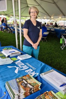 Judy Benson, communications coordinator for Sea Grant, gave out copies of Wrack Lines magazine and other Sea Grant publications during the Shad Bake.