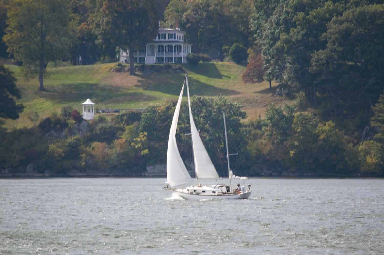 A sailboat is seen from the eastern shore of the Hudson River at the Norrie Point Environmental Center in Staatsburg, N.Y. Photo: Bill Leukhardt