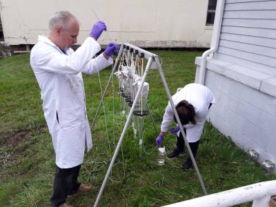 Prof. Ward and Mladinich settle out marine aggregate from samples collected from the Sound in 2018 as part of an earlier phase of research into microplastics and oysters.
