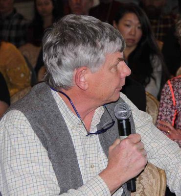Joth Davis, a grower and researcher with a shellfish farm on Thorndyke Bay in Washington state, asks a question to one of the presenters.