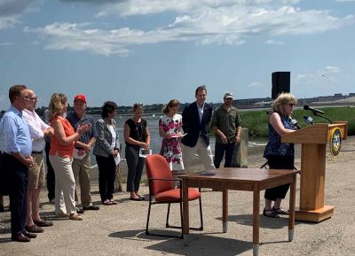 Connecticut Sea Grant Associate Director Nancy Balcom highlights the program’s collaborative restoration efforts with the Department of Agricultures during the bill signing ceremony.