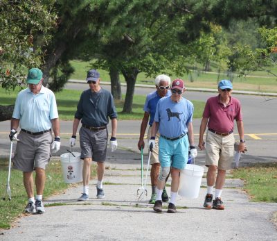 Several members of the Y’s Men, a retired men’s association in Westport and Weston, were among the more than 25 volunteers who joined the cleanup. Group members walk at the park twice a week.