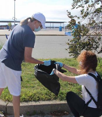 Volunteers Peg Genung of Waterford, left, and Barbara Haid of Meriden picked up dozens of cigarette butts during the cleanup. Cigarette butts were the most numerous item collected by all the groups.