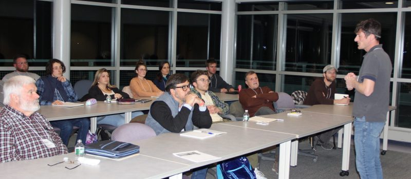 Michael Gilman, right, aquaculture extension assistant, teaches students in the "Foundations of Shellfish Farming" course that began on Jan. 24.