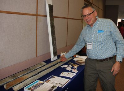 State Soil Scientist Donald Parizek shows examples of soil cores before his talk about the Long Island Sound Coastal Zone Soil Survey.