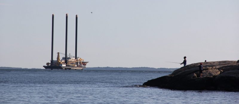 The vessel L/B Jill, a construction vessel being used to support the South Fork Wind offshore wind farm off Long Island, is seen from Waterford Town Beach on July 30. The vessel was moored in Long Island Sound for a few days due to an incoming storm.