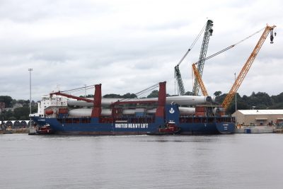 Large vessels with heavy-lift capacity are being used to transport components of the South Fork wind farm to State Pier in New London.