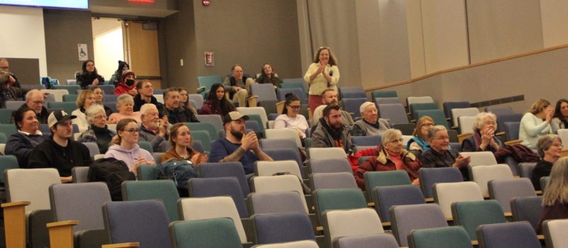 Audience members applaud after the Coastal Perspectives Lecture by author and artist Patrick Lynch titled, "A Tale of Two Estuaries."