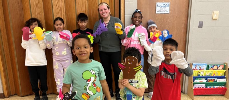 Students at the Drop-In Learning Center in New London show sea creature puppets they made during an outreach activity led by CTSG staff during school vacation week.