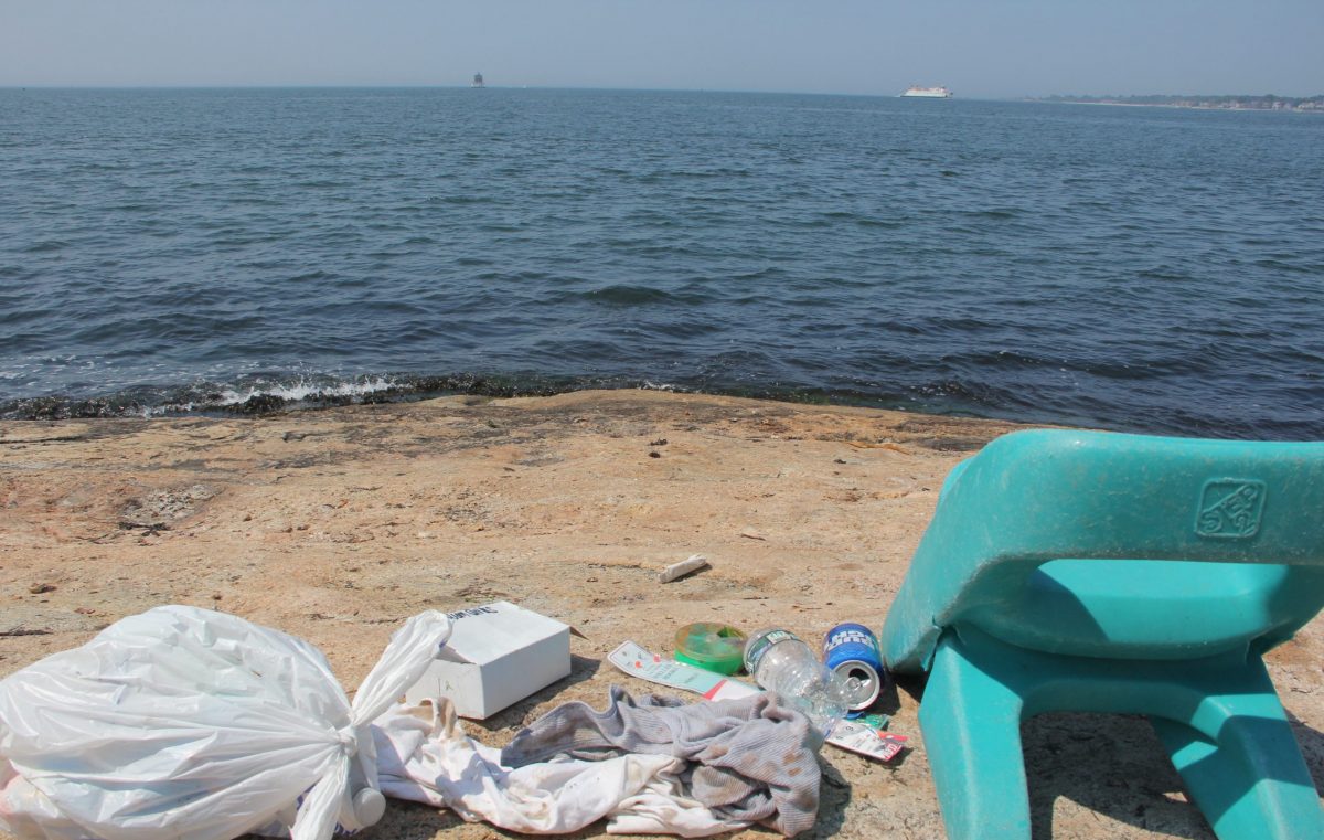 Trash including a portable chair left at a popular fishing spot on the Thames River is likely to get carried into Long Island Sound by a high tide or storm.