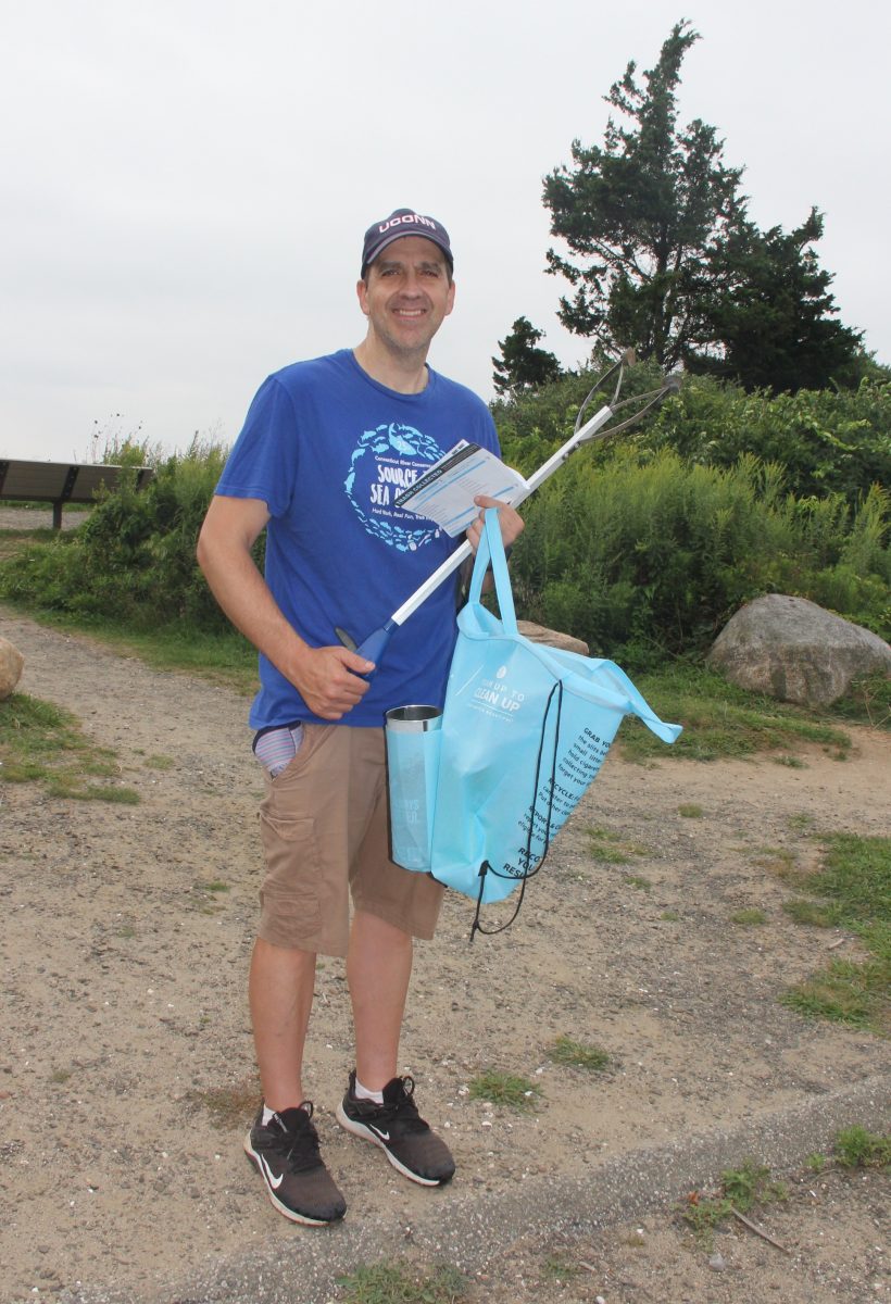 Glen Gleissner of Middlebury used a bag from Keep America Beautiful organization to collect trash.