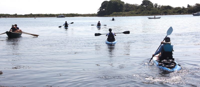 Kayakers and rowers paddle from the shores of UConn Avery Point during the Messing About in Boats event for students, faculty and staff Sept. 13 sponsored by the CT NERR, CT Sea Grant, the John Gardner Chapter of the Traditional Small Craft Association and the campus.