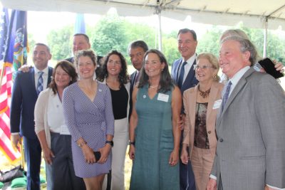 Nancy Seligson, center front, N.Y. co-chair of the CCMP Citizens Advisory Committee and mistress of ceremonies, gathered with Congressmen, EPA and CT and NY officials after the signing.