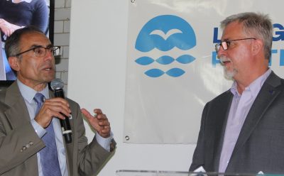 Mark Tedesco, left, who retired recently after nearly four decades as director of EPA's Long Island Sound office, poses a question to CTSG Director Sylvain De Guise during an afternoon panel discussion about progress and future goals for the Sound. Tedesco received an EPA Distinguished Career Service Award during the event.