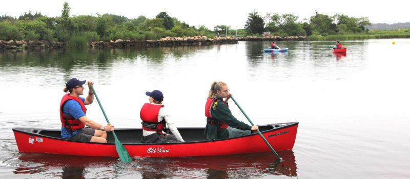 Participants ply canoes and kayaks during in the paddle and nature exploration event at Bluff Point State Park on June 28 hosted by the CT NERR and CT Sea Grant.