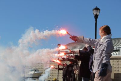 Students learn to deploy handheld flares during the training.