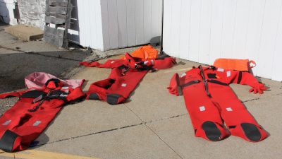 Immersion suits are laid out to dry after the in-water exercise.