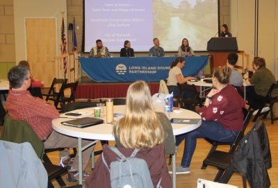 Deb Abibou, right, of the CTSG Sustainable and Resilient Communities team, moderated a panel discussion about programs that had been successful in previous grant awards.