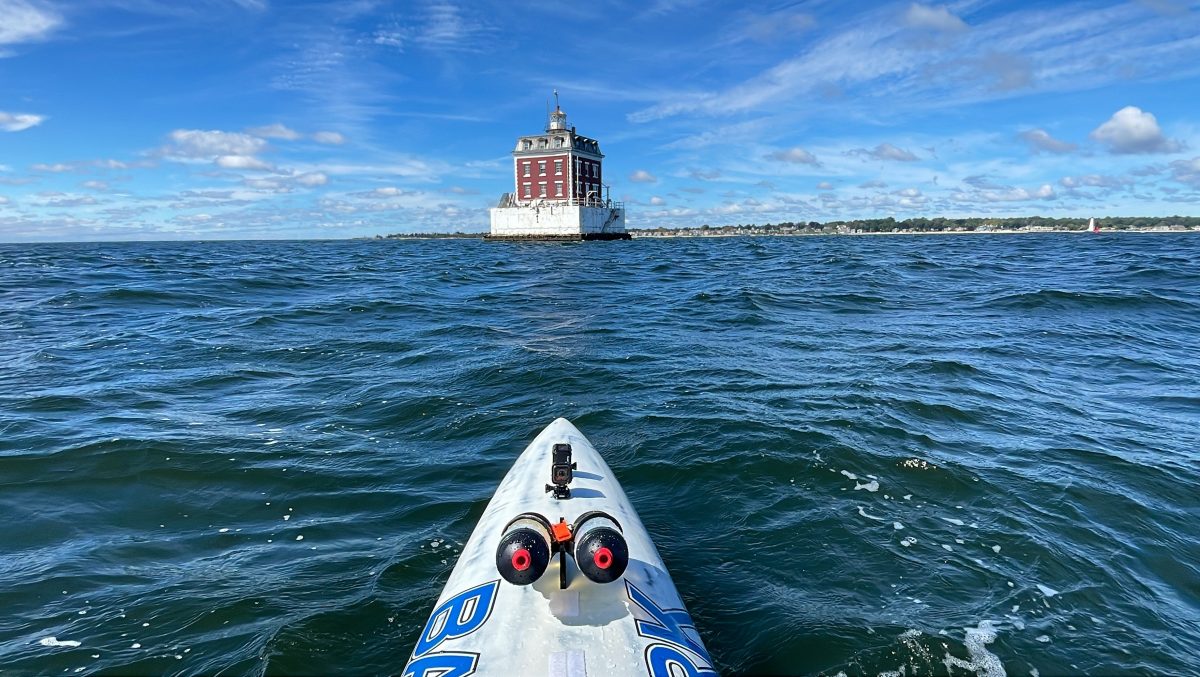 Image captured from paddleboard during a six-mile trip in September heading towards New London Ledge Light to gather data off Avery Point, including GPS lines, coordinates and information on tides and currents.