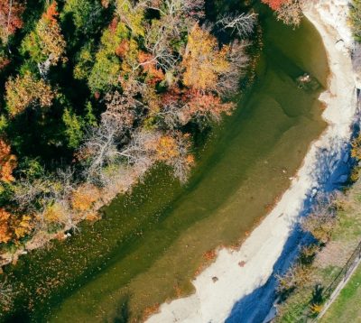 Aerial view of river and riparian areas along its banks
